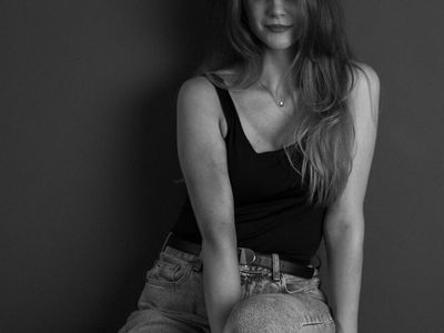 Person doing a tree pose outdoors